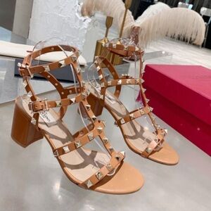 Sandals . Worn only during photoshoots & filming